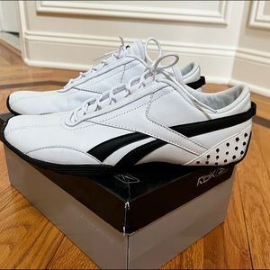 RVX white and black sneakers.